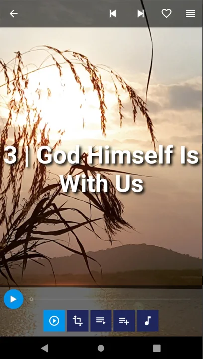 A hymn verse lit up over a photograph while its recording plays